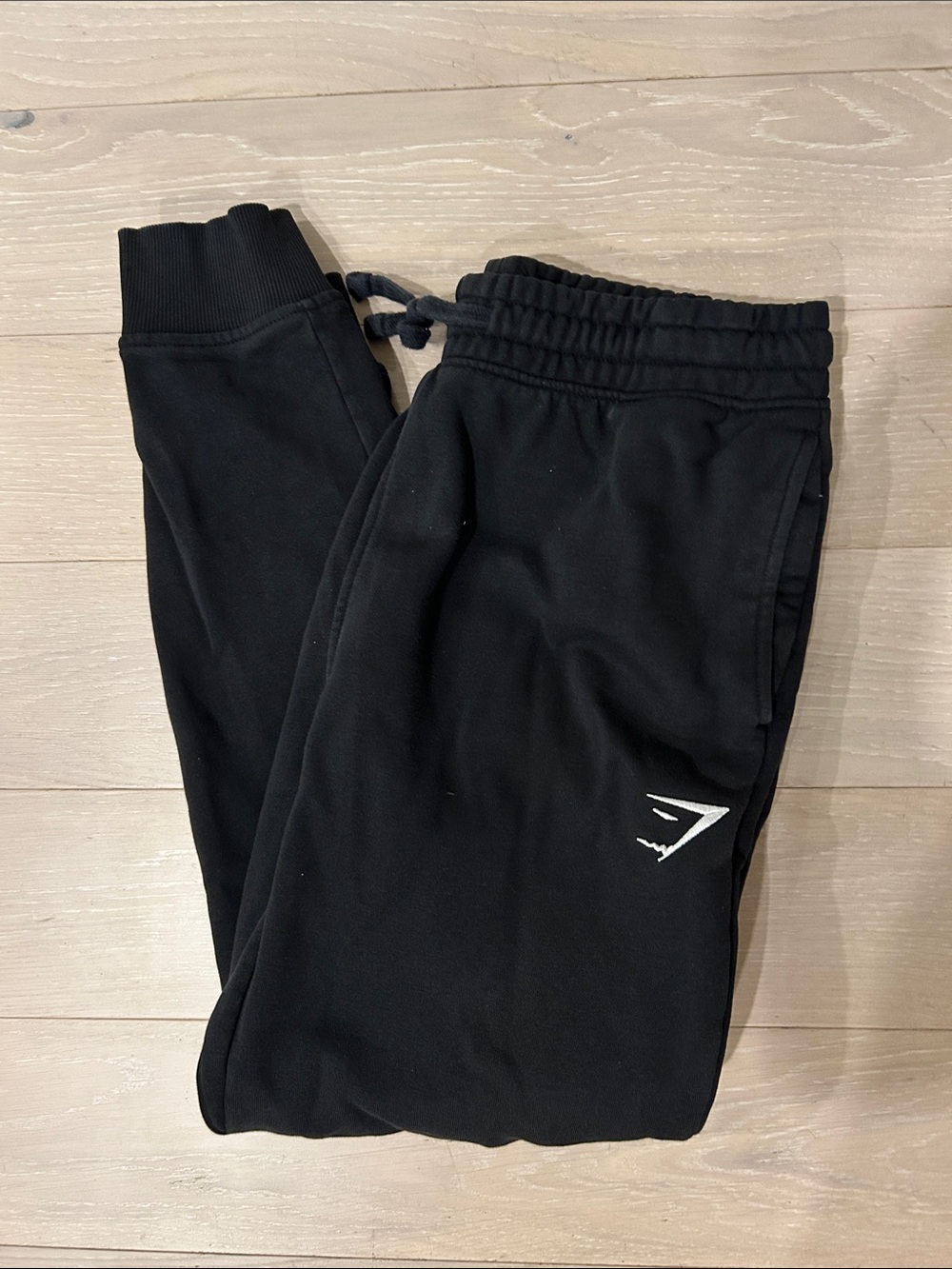 Gymshark Kids Black Jogger Sweatpants with White Logo